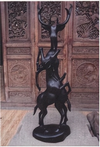 三峡阴沉木家具制作_奉节阴沉木雕刻技艺_木头佛像雕刻