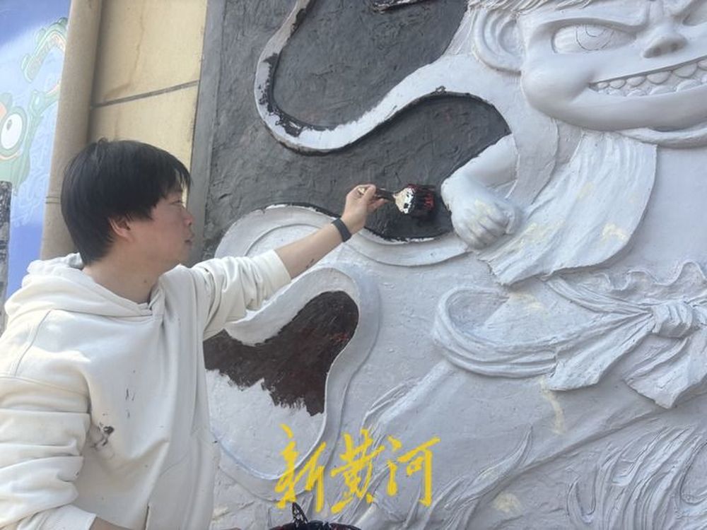 浮雕墙画图片欣赏_刘贺雕塑工作室_济南最大哪吒浮雕