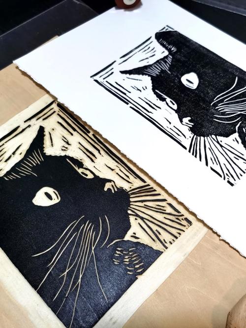 手工木刻版画制作_木刻画图片_猫狗双全幸福生活