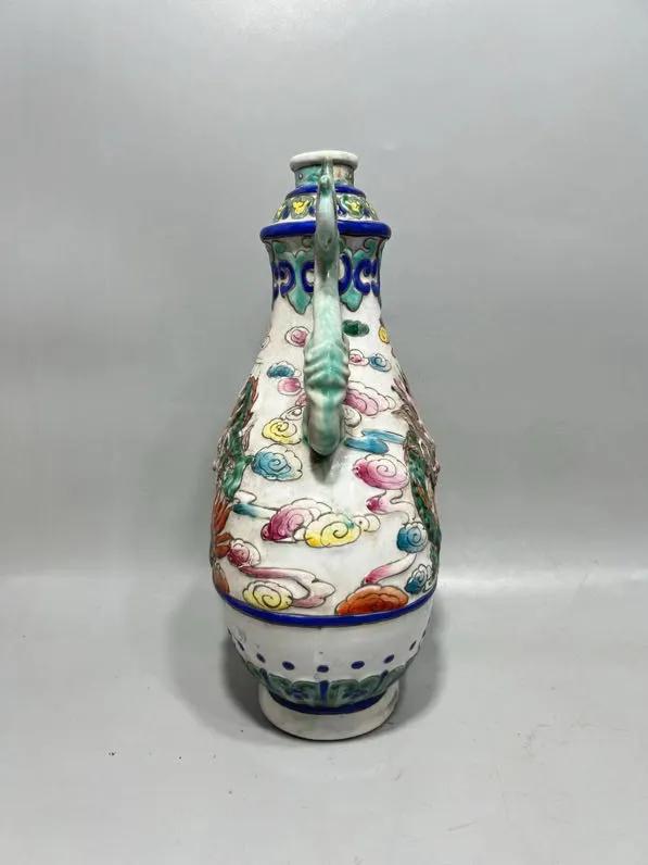 清朝瓷器艺术_清粉彩浮雕龙纹花瓶_浮雕花瓶图片大全